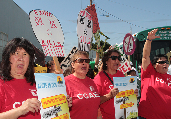 Protesters demonstrate in front of Exide Technologies' Vernon plant about poisonous emissions from the facility. The state announced Aug. 20 it would spend $7 million to expedite the cleanup of contamination in the neighborhoods surrounding the plant.
(File photo)