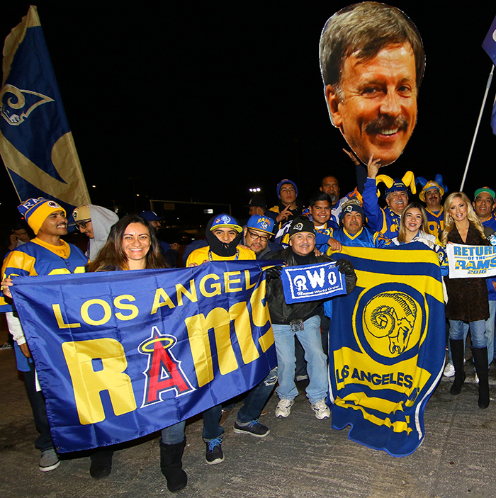 Los Angeles Rams fans celebrated in the parking lot of the Forum last January after it was announced that the Rams would be moving from St. Louis. Ground will be broken on the new stadium on the site of the old Hollywood Park Race Track Nov. 17.
(Photo by Nick Koza)