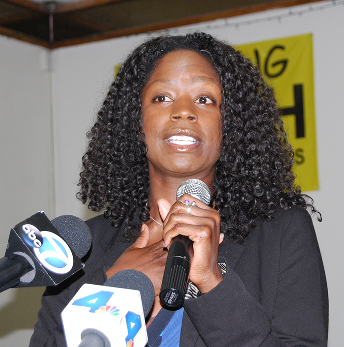 Rasheda Kilpatrick, an attorney for the National Action Network Los Angeles, speaks at a town hall meeting July 11 at Concord Church in South Los Angeles that addressed recent police shootings of black men. (Photo courtesy of Fifth Avenue Times)